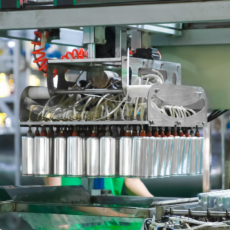 Automated machinery filling aluminum cans